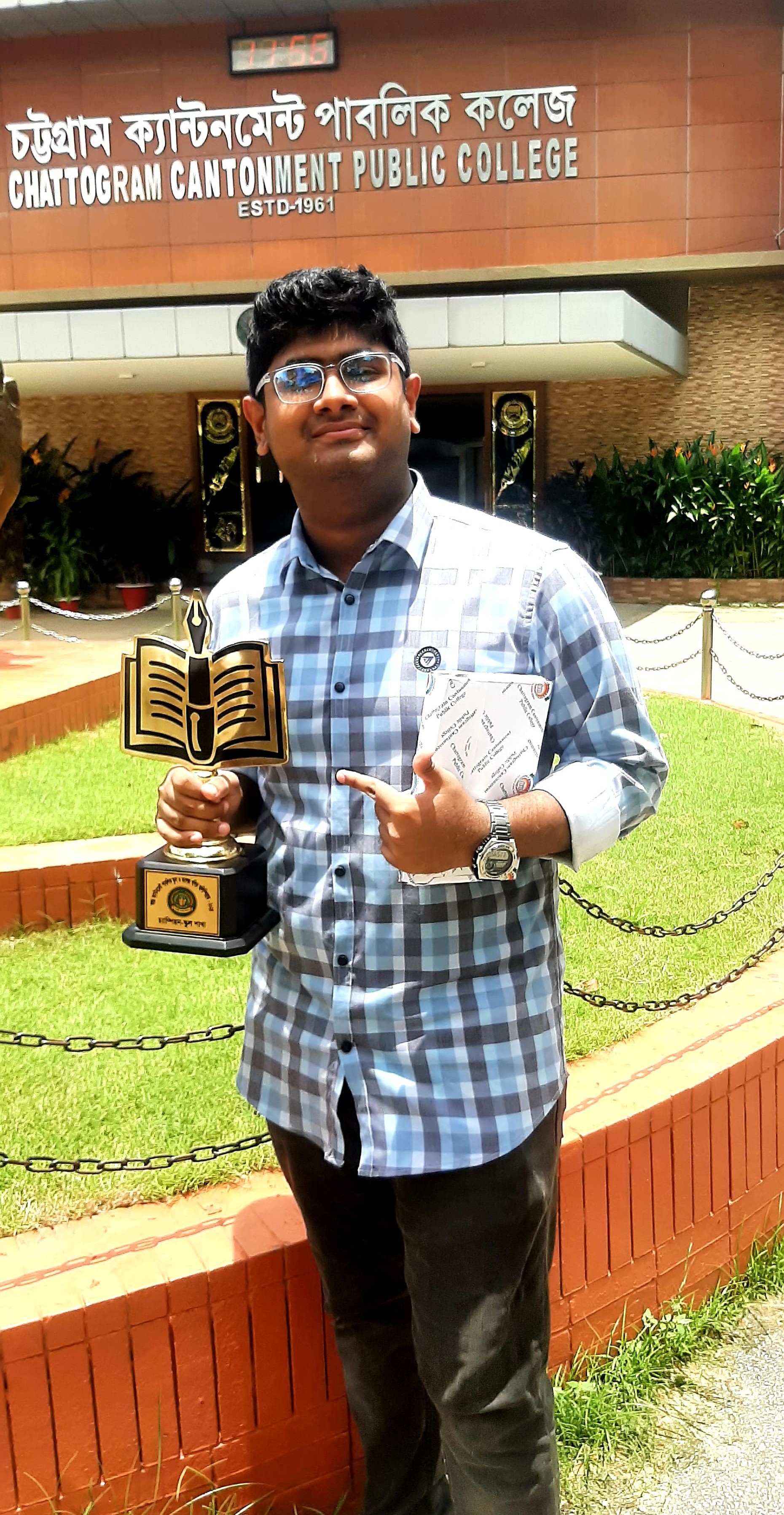 Arhab Nayeel with the Champions Trophy of Inter Cantonment Math Olympiad 2024